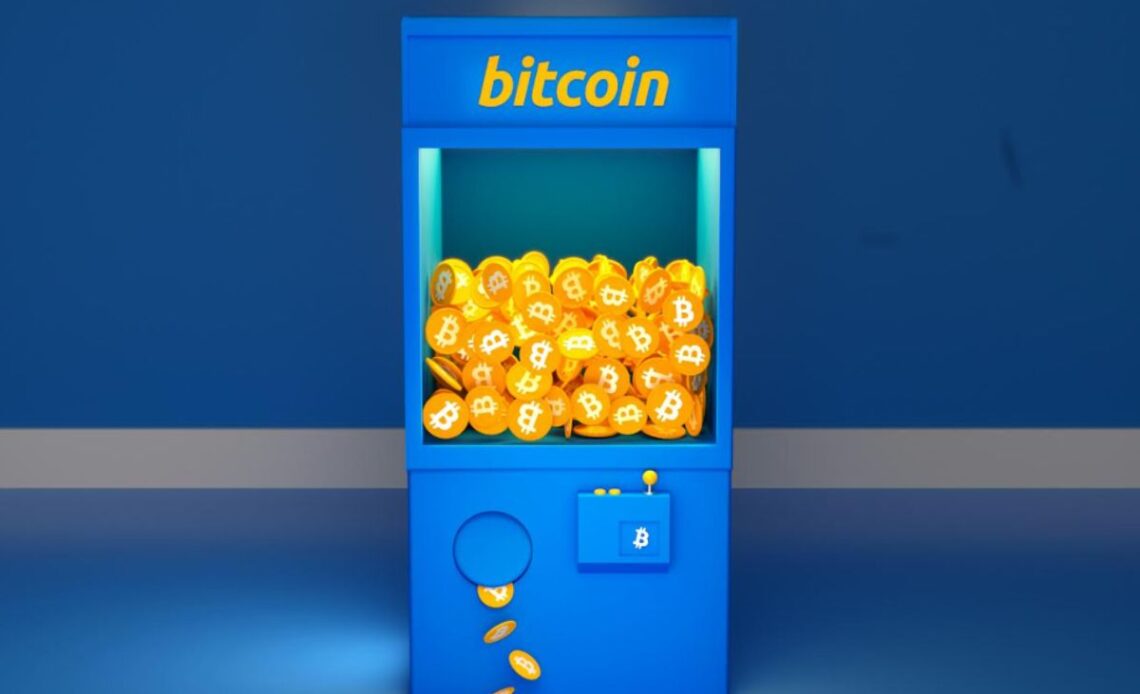 Bitcoin ATM machine with digital coins for quick and easy cryptocurrency access nearby